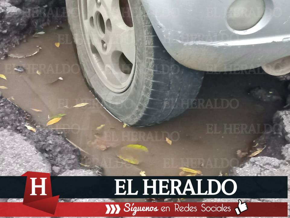 xigen reparación de carretera en Naolinco